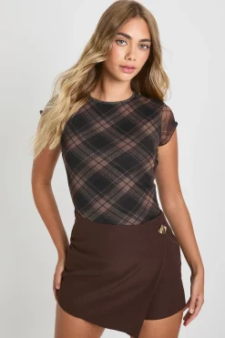 Skort mini à devant enveloppé avec garniture dorée