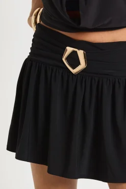 Skort moulant avec détails de garniture et ourlet à volants