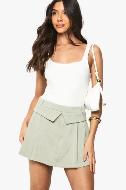Skort plissé ajusté à rabat