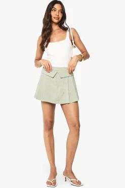 Skort plissé ajusté à rabat