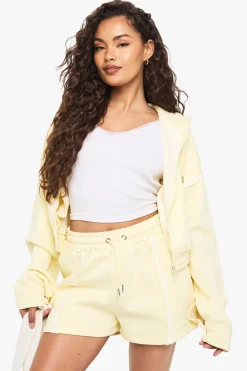 Survêtement court à zip avec couture apparente