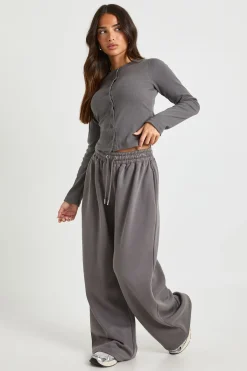 boohoo Survêtement à manches longues en petites côtes avec patte boutonnée traversante<Femme Survêtements|Survêtements