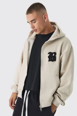 Sweat à capuche ample zippé à écusson B
