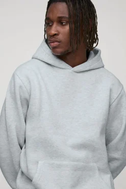 Sweat à capuche basique pour personnes grandes, coupe régulière, à enfiler par-dessus la tête.