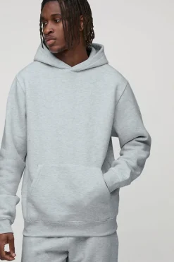 Sweat à capuche basique pour personnes grandes, coupe régulière, à enfiler par-dessus la tête.