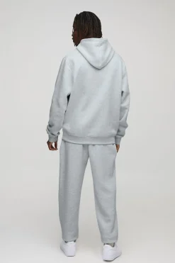 Sweat à capuche basique pour personnes grandes, coupe régulière, à enfiler par-dessus la tête.