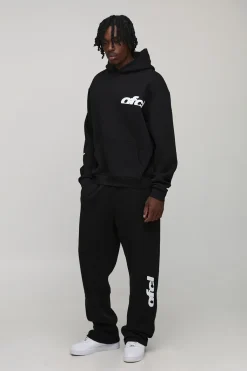 Sweat à capuche long, surdimensionné et de coupe carrée à imprimé OFCL & survêtement jogger à coupe ample avec cordon allongé