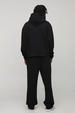 Sweat à capuche long, surdimensionné et de coupe carrée à imprimé OFCL & survêtement jogger à coupe ample avec cordon allongé