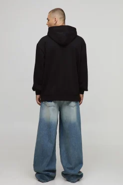 Sweat à capuche noir surdimensionné imprimé sous licence Tyla