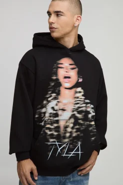 Sweat à capuche noir surdimensionné imprimé sous licence Tyla