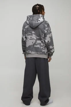 Sweat à capuche oversize à appliqué croisé camouflage avec zip intégral