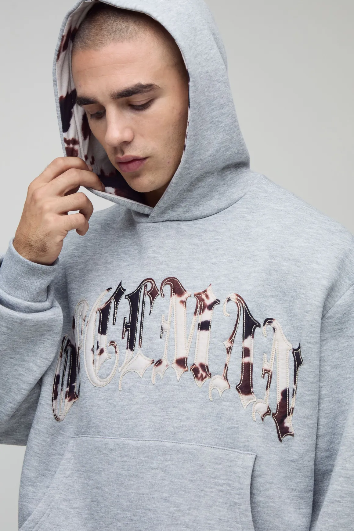 Sweat à capuche oversize boxy à appliqué imprimé vache
