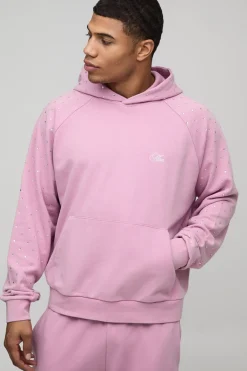 Sweat à capuche raglan surdimensionné pour homme à la coupe carrée, orné de strass et délavé.