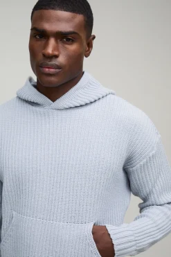 Sweat à capuche tricoté côtelé à coupe boxy