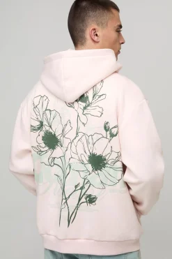 Sweat à capuche zippé oversize à motif floral et imprimé en relief