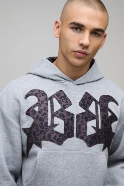 boohooMAN Sweat à Casynthétiqueche Surdimensionné Boxy avec Appliqué Imprimé Léopard<Homme Sweats À Capuche Et Sweatshirts|Sweats À Capuche Et Sweats