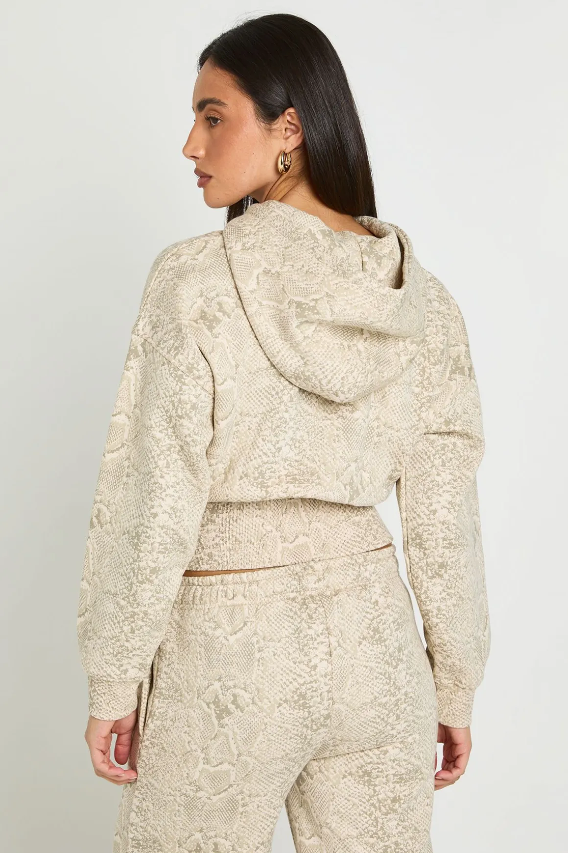 Sweat À Casynthétiqueche Zippé Court Imprimé Synthétique Avec Ourlet Profond