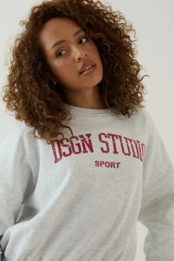 Sweat-shirt Col Rond Manches Bouffantes Imprimé Universitaire Dsgn Studio
