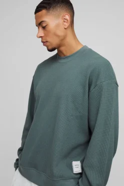 Sweat-shirt en nid d’abeille à col étendu pour homme, coupe boxy, avec languette tissée