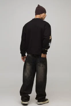 Sweat-shirt noir surdimensionné à la coupe boxy avec imprimé western et col allongé