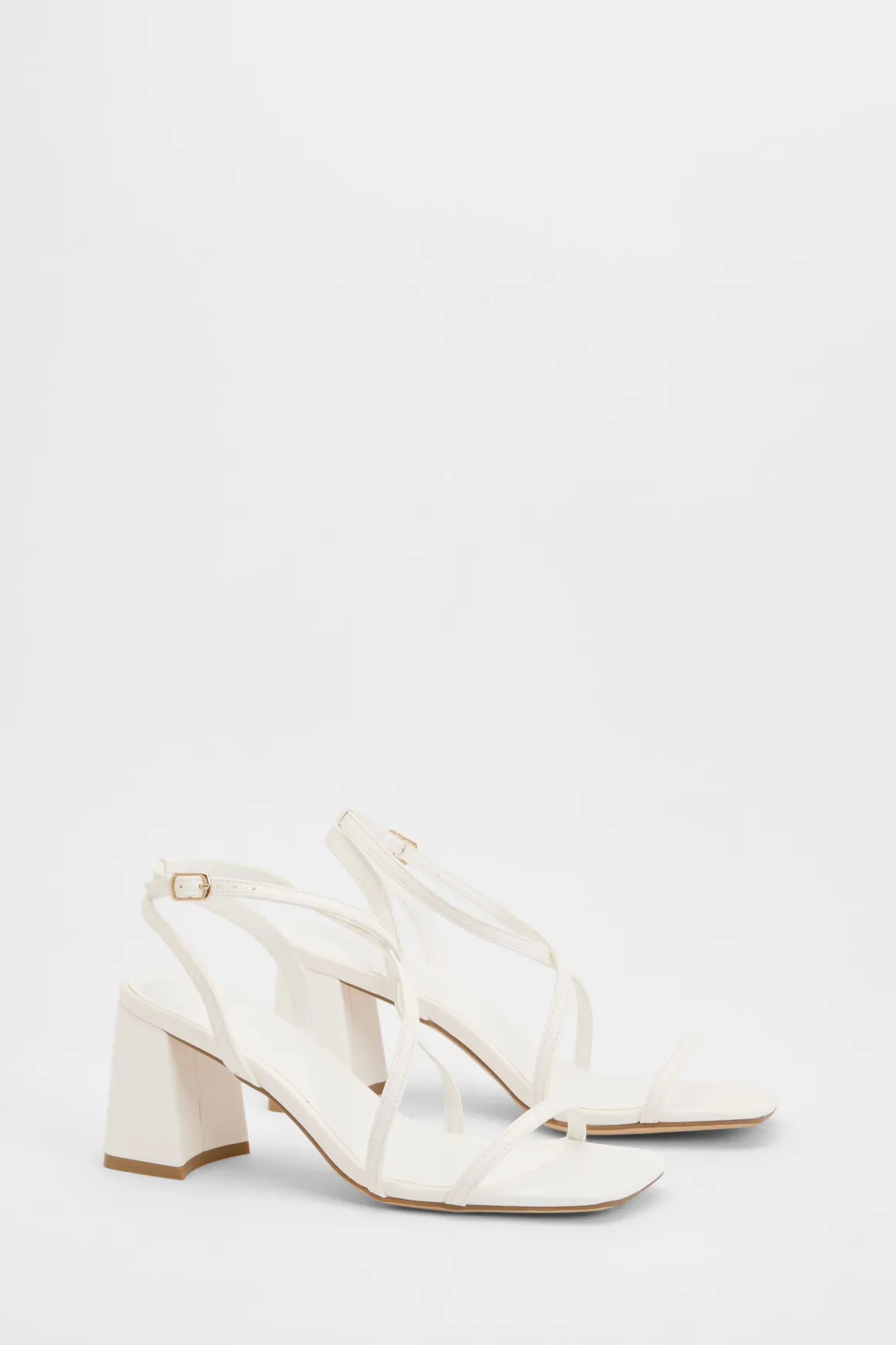 Talons À Bloc Mi-hauteur Avec Brides Croisées Sur Le Devant