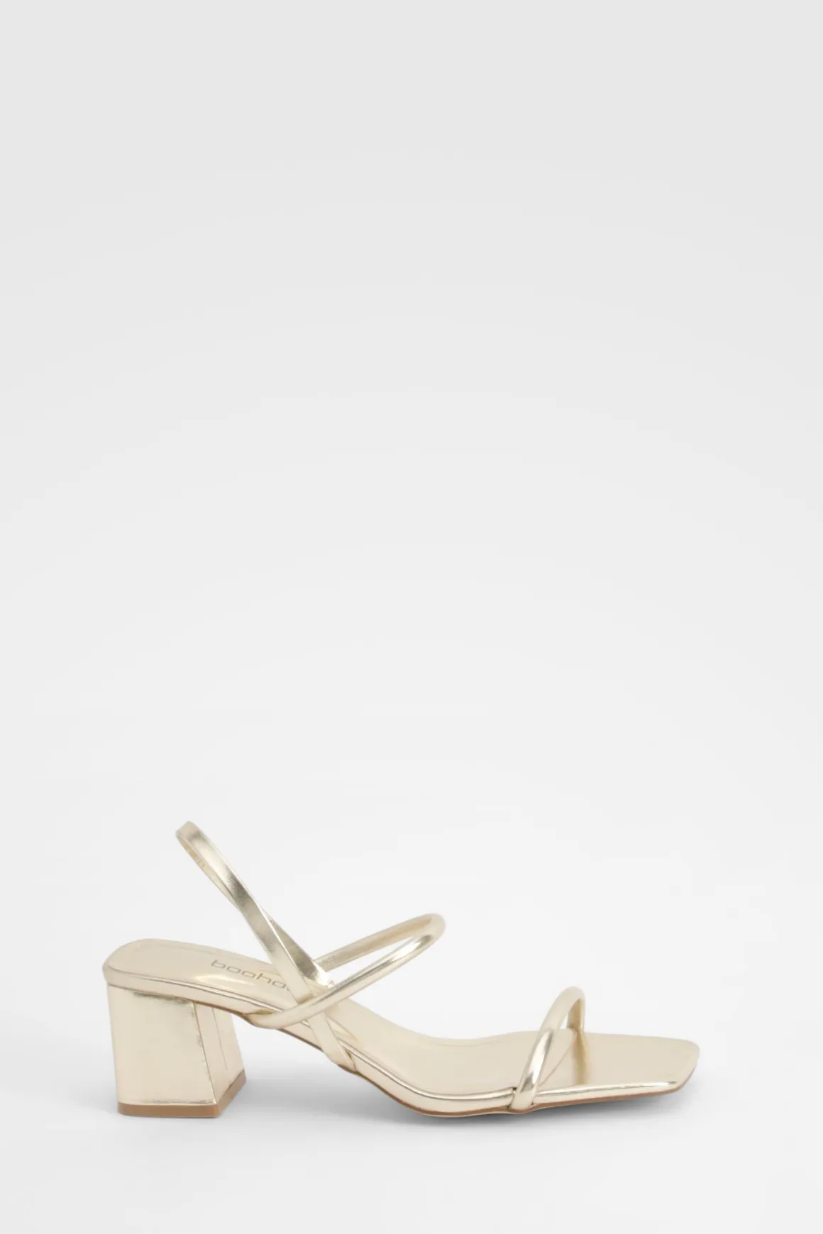 Talons compensés métalliques à bride arrière pour pieds larges