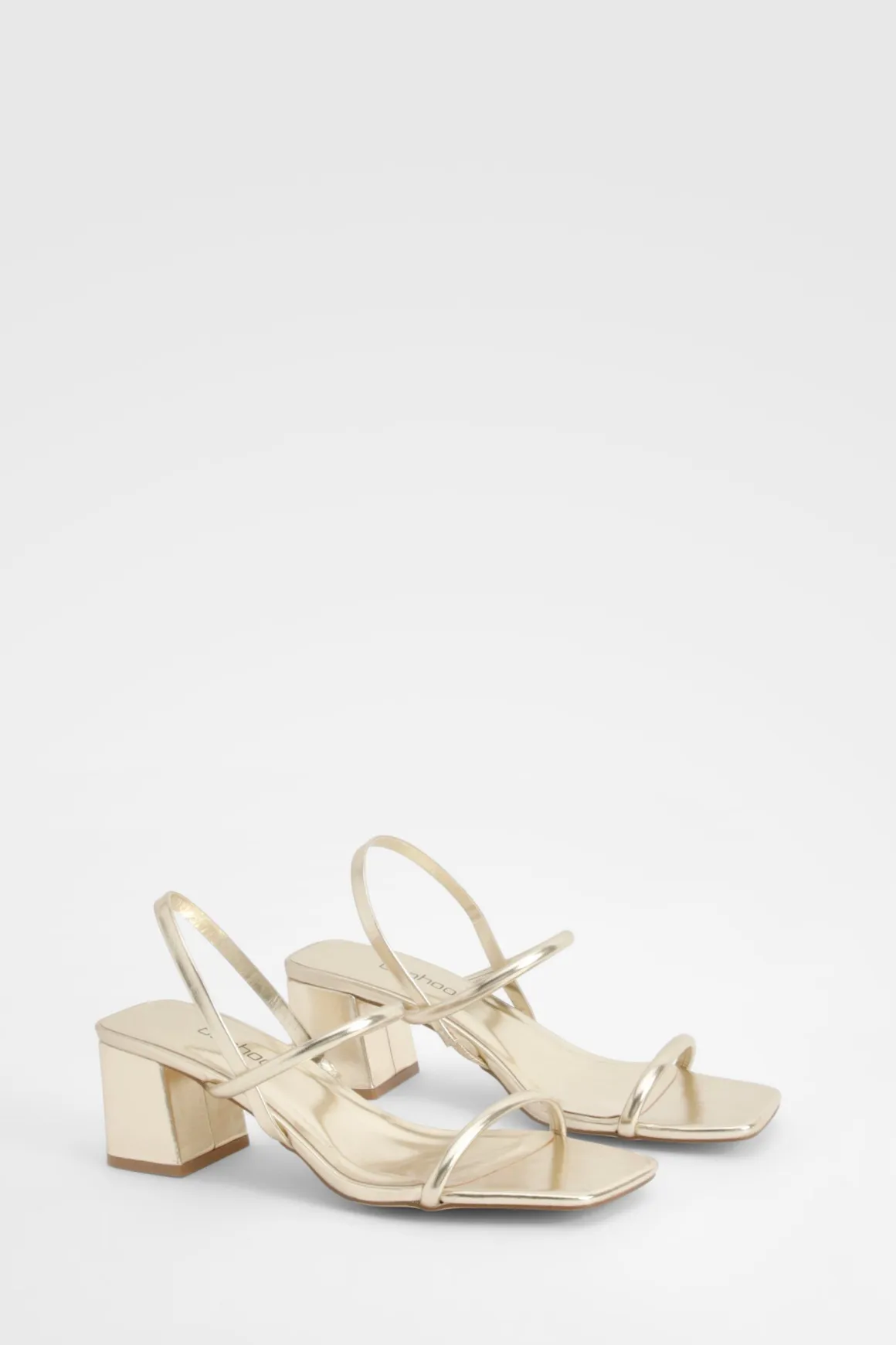 Talons compensés métalliques à bride arrière pour pieds larges