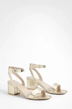 Talons métalliques à coupe large, bloc bas et brides à peine perceptibles