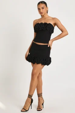 Top bandeau orné de rosettes