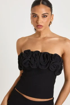 Top bandeau orné de rosettes
