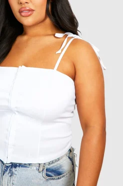 Top corset grande taille à attaches crochets et œillets et épaules nouables