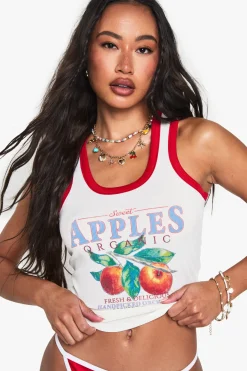 Top court sans manches en maille côtelée avec empiècement contrasté et imprimé graphique de pommes