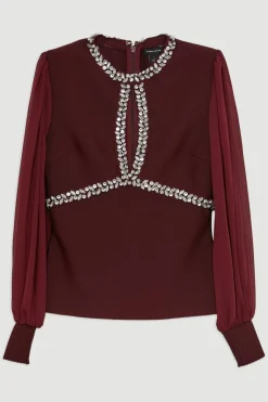 Top en maille ajusté orné et manches en chiffon à effet bandage