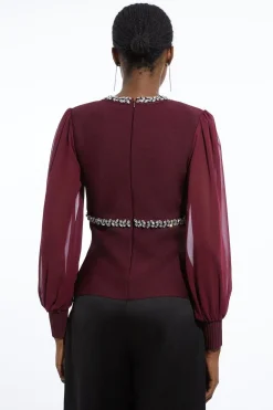 Top en maille ajusté orné et manches en chiffon à effet bandage