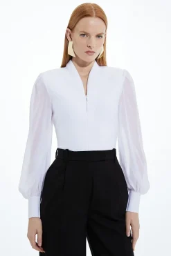 Top en maille à effet bandage, détail zip et manches en chiffon