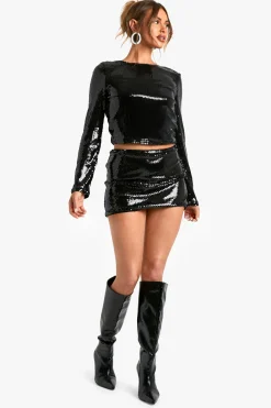 Top à sequins à manches longues avec dos drapé