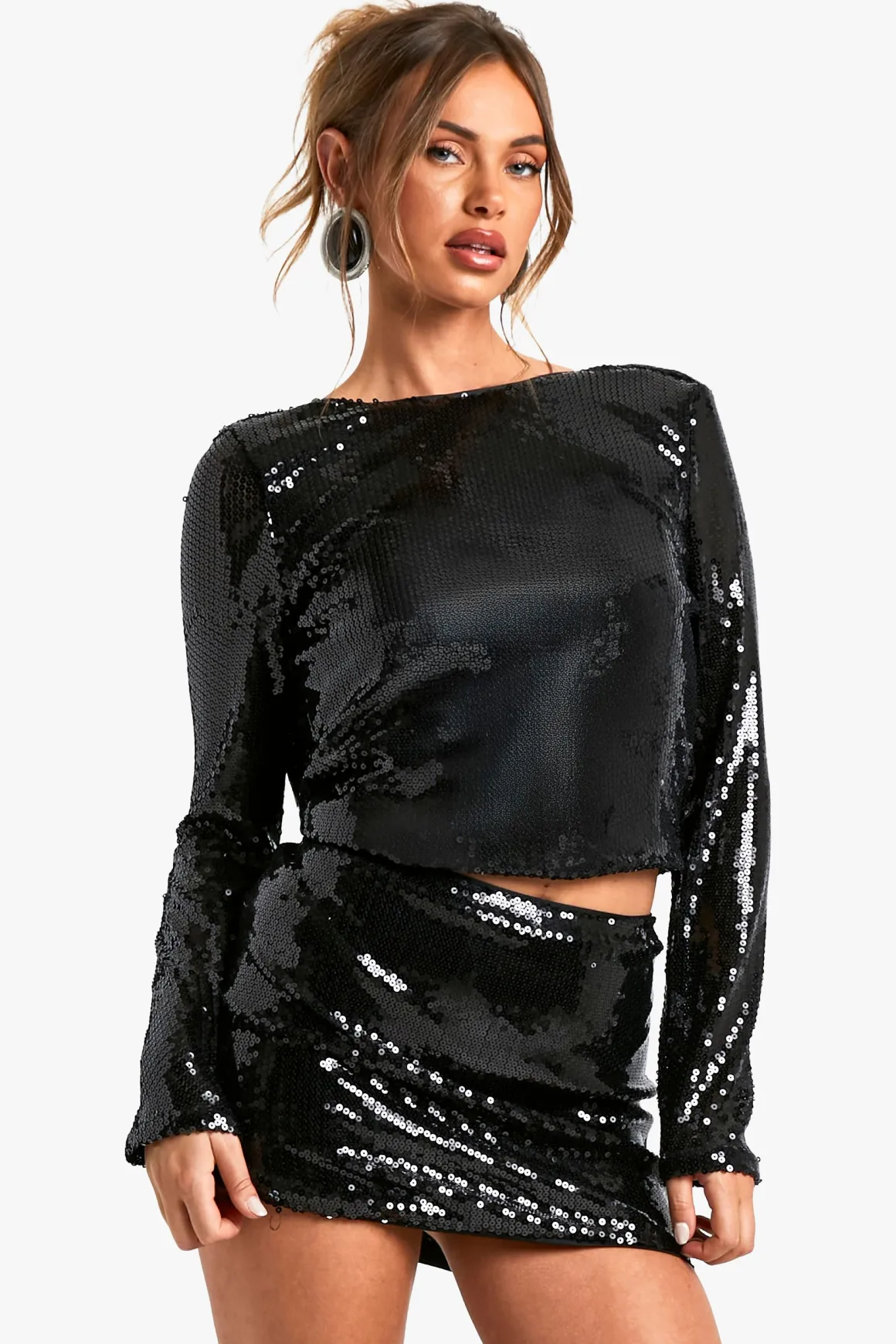 Top à sequins à manches longues avec dos drapé