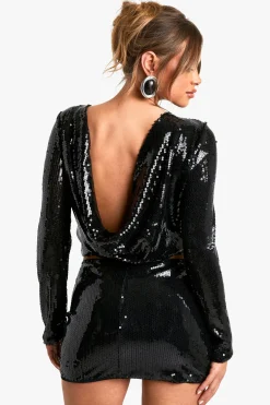 Top à sequins à manches longues avec dos drapé