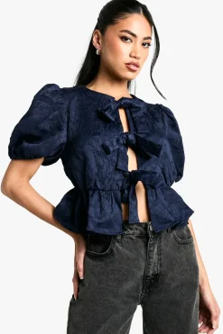 Top texturé à manches bouffantes et attaches