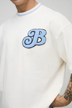 T-shirt brodé de style varsity surdimensionné