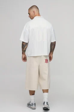T-shirt De Sport Ample Col V En Mesh À Rayures Universitaires Oversize