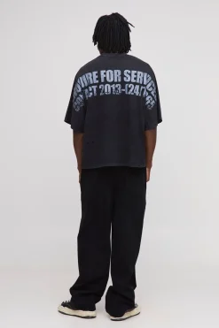 T-shirt grande taille, surdimensionné, de coupe carrée aux manches chauve-souris, en tissu épais, lavé et effet usé, orné d'un slogan et d'une poche