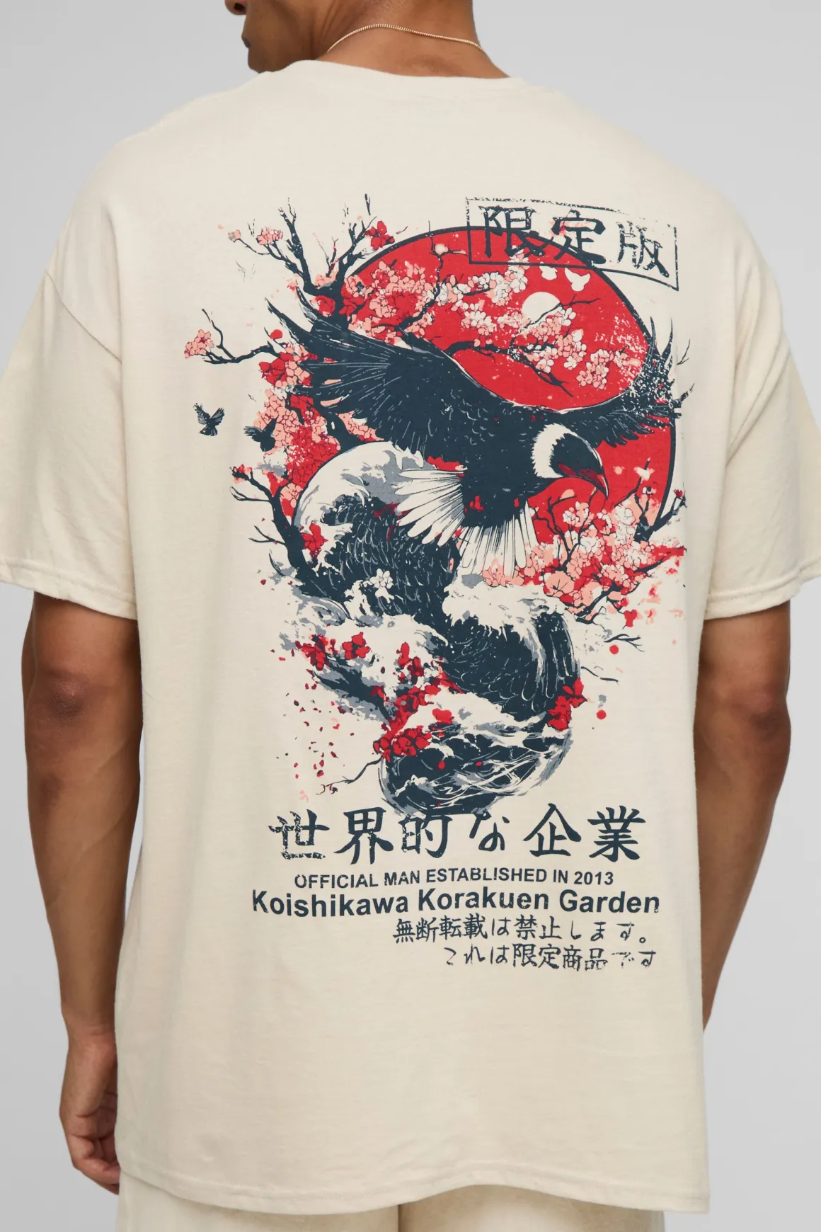 T-shirt graphique avec un oiseau surdimensionné