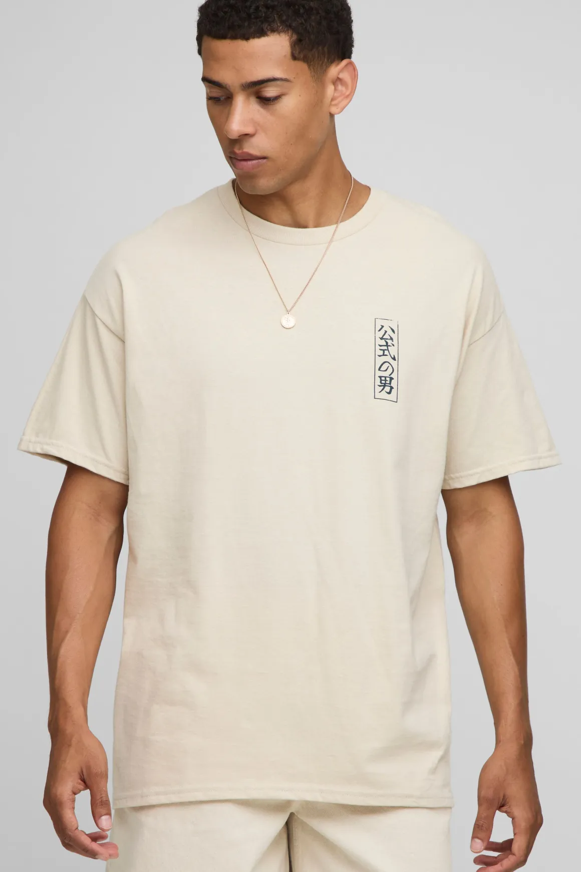 T-shirt graphique avec un oiseau surdimensionné