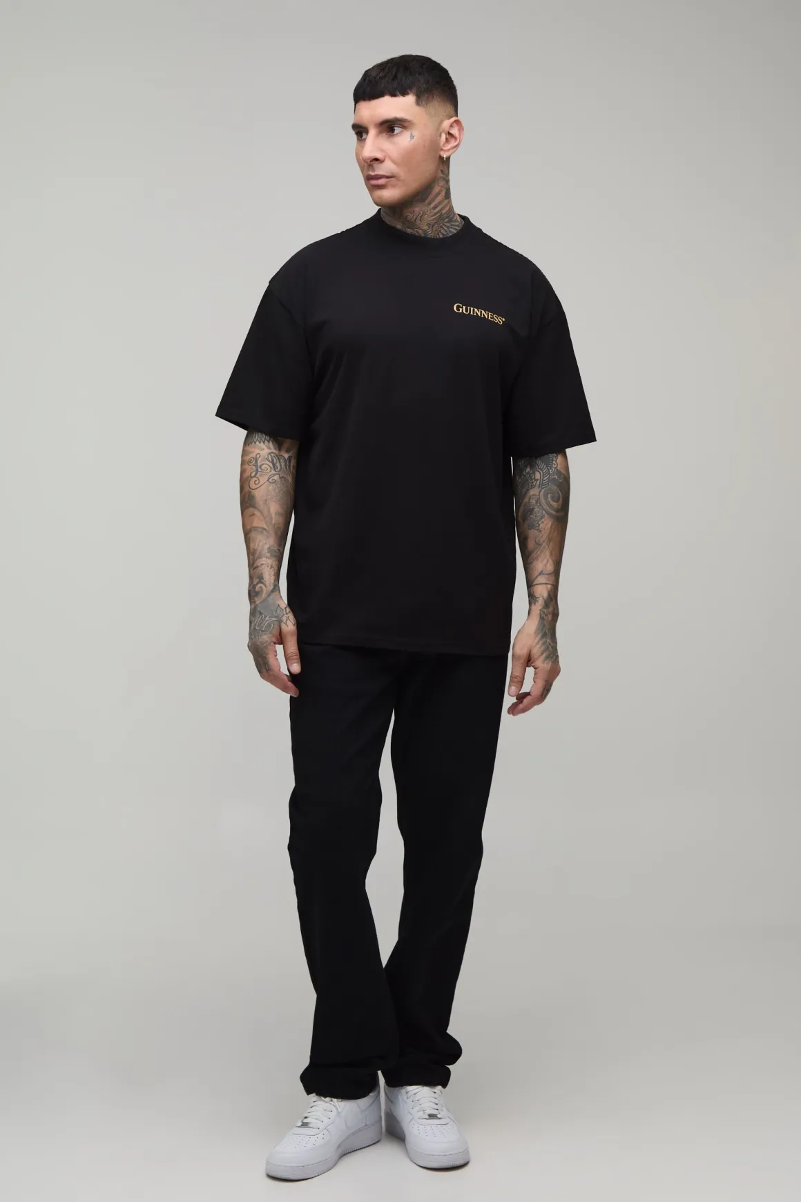 T-shirt Guinness Sous Licence Imprimé Noir Oversize Tall Avec Encolure Prolongée