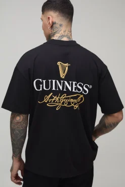 T-shirt Guinness Sous Licence Imprimé Noir Oversize Tall Avec Encolure Prolongée