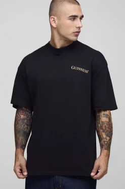 T-shirt noir surdimensionné à col étendu imprimé sous licence Guinness