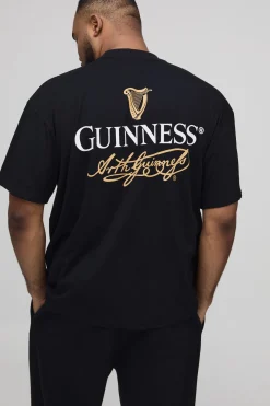 T-shirt noir surdimensionné à col étendu imprimé sous licence Guinness