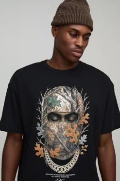 T-shirt noir surdimensionné à col étendu avec imprimé masque de ski