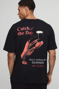 T-shirt noir surdimensionné imprimé avec licence Guinness